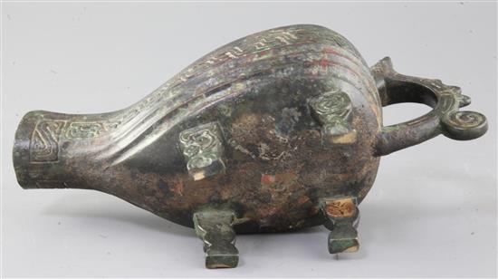 A Chinese archaic bronze ritual pouring vessel, Yi, possibly Western Zhou dynasty, 9th-8th century B.C., 28cm long